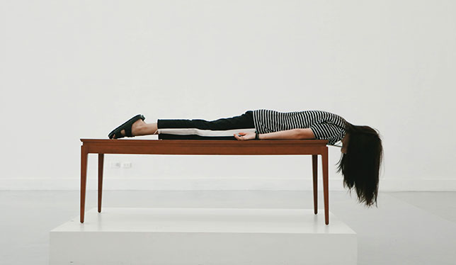 women lying on table