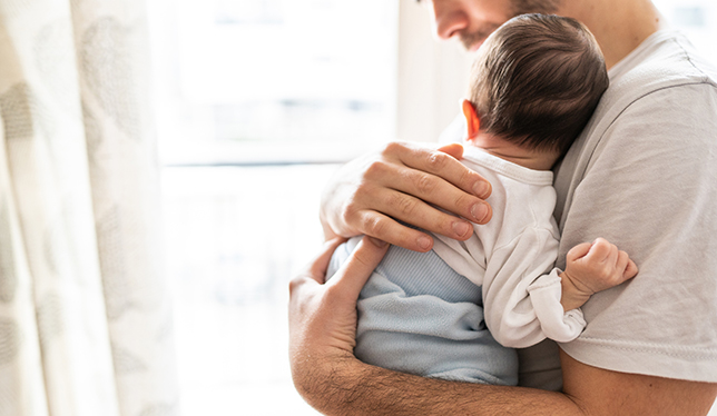 A man with a baby
